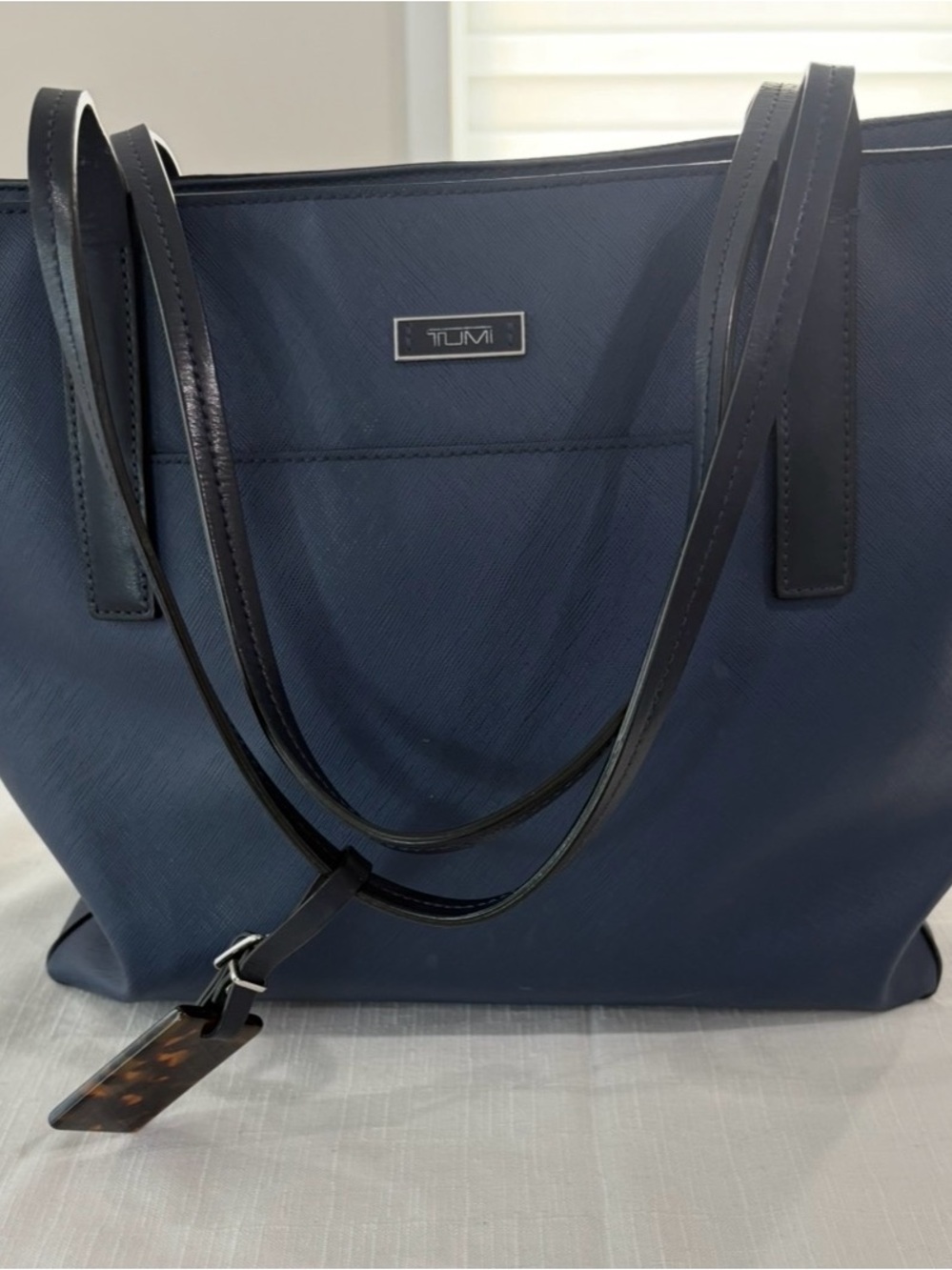 Tumi Navy Tote with Black Leather Straps